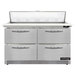 A stainless steel Continental Refrigerator with 4 drawers under a cutting top.