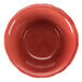 A close-up of a red bowl with a white background.