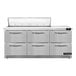 A stainless steel Continental Refrigerator with six drawers.