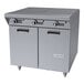 A stainless steel commercial hot top range with three control knobs and a double-door storage base.