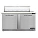 A stainless steel Continental Refrigerator with two doors and a cutting top.