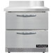 A white worktop refrigerator with two drawers.