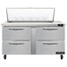 The stainless steel drawers of a Continental Refrigerator 4 drawer sandwich prep table.