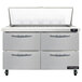 A stainless steel Continental Refrigerator with 4 drawers.