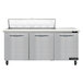 A stainless steel Continental Refrigerator with 3 doors and a cutting top.