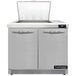 A large stainless steel Continental Refrigerator with two doors open.