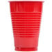 A package of red plastic cups with a white background.