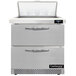 A Continental Refrigerator stainless steel sandwich prep table with 2 drawers.