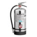 A Buckeye Class K fire extinguisher with a black hose and handle.