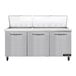 A stainless steel Continental Refrigerator sandwich prep table with three doors.