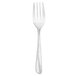 A silver Walco Classic Scroll salad fork with a white background.