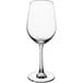 An Acopa Covella wine glass with a stem on a white background.