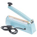 An Omcan blue and silver bag sealer with a black cord.