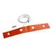 An orange plastic strap with wires attached to it.