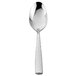 A close-up of a Walco stainless steel teaspoon with a textured handle.