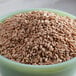 A white bowl of Bob's Red Mill organic brown farro.