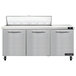 A stainless steel Continental Refrigerator with three doors and a counter top.