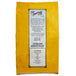 A yellow bag of Bob's Red Mill Gluten-Free Organic Brown Rice Flour with black text on it.