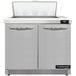 A Continental Refrigerator stainless steel 2 door sandwich prep table.