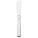 A silver Walco 18/0 stainless steel butter knife.