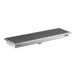 A rectangular 18 by 60 inch stainless steel floor trough with a grated cover.