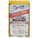 A bag of Bob's Red Mill Organic Tri-Color Quinoa on a white background.