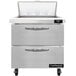 A stainless steel Continental Refrigerator with 2 large drawers open.