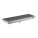 A rectangular 18 by 54 inch stainless steel floor trough with a grated cover.