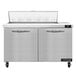 A stainless steel Continental Refrigerator with two doors and a lid.