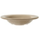 A close up of a GET Tahoe sandstone bowl on a white surface.