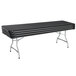 A black rectangular Lifetime plastic folding table with metal legs.