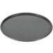 A Chicago Metallic hard coat anodized aluminum pizza pan on a table.