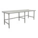 An Advance Tabco stainless steel work table with an open base and long legs.