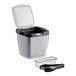 An OXO plastic ice bucket set with tongs and garnish tray.