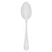 A Walco stainless steel dessert spoon with a white handle.