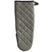 A SafeMitt quilted oven mitt with a black neoprene grip.