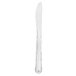 A stainless steel Walco children's dinner knife with a silver handle.