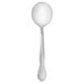 A Walco stainless steel bouillon spoon with a white handle.