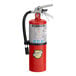 A Buckeye red fire extinguisher with a black handle.