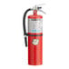 A Buckeye fire extinguisher with a black hose and wall mount.