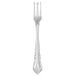 A silver Walco Discretion cocktail fork.