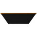 A black rectangular melamine bowl with an orange border.
