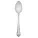 A Walco Discretion stainless steel teaspoon with a handle.
