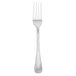 A Walco stainless steel dinner fork with a textured silver handle.