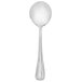A silver spoon with a black handle on a white background.