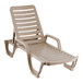 A taupe-colored adjustable resin chaise lounge chair with a slatted design and armrests.