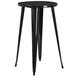 A Flash Furniture black metal bar height table with a round top and 4 black metal stools with legs.