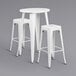 a white stool with legs