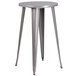 A Flash Furniture round silver metal bar height table with metal stools.