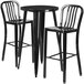 A Flash Furniture black metal bar table and 2 stools.